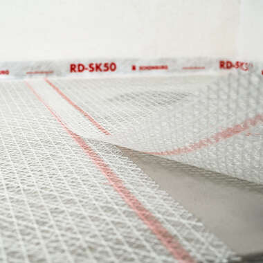 Rolling out and laying